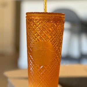 Starbucks orange cold cup